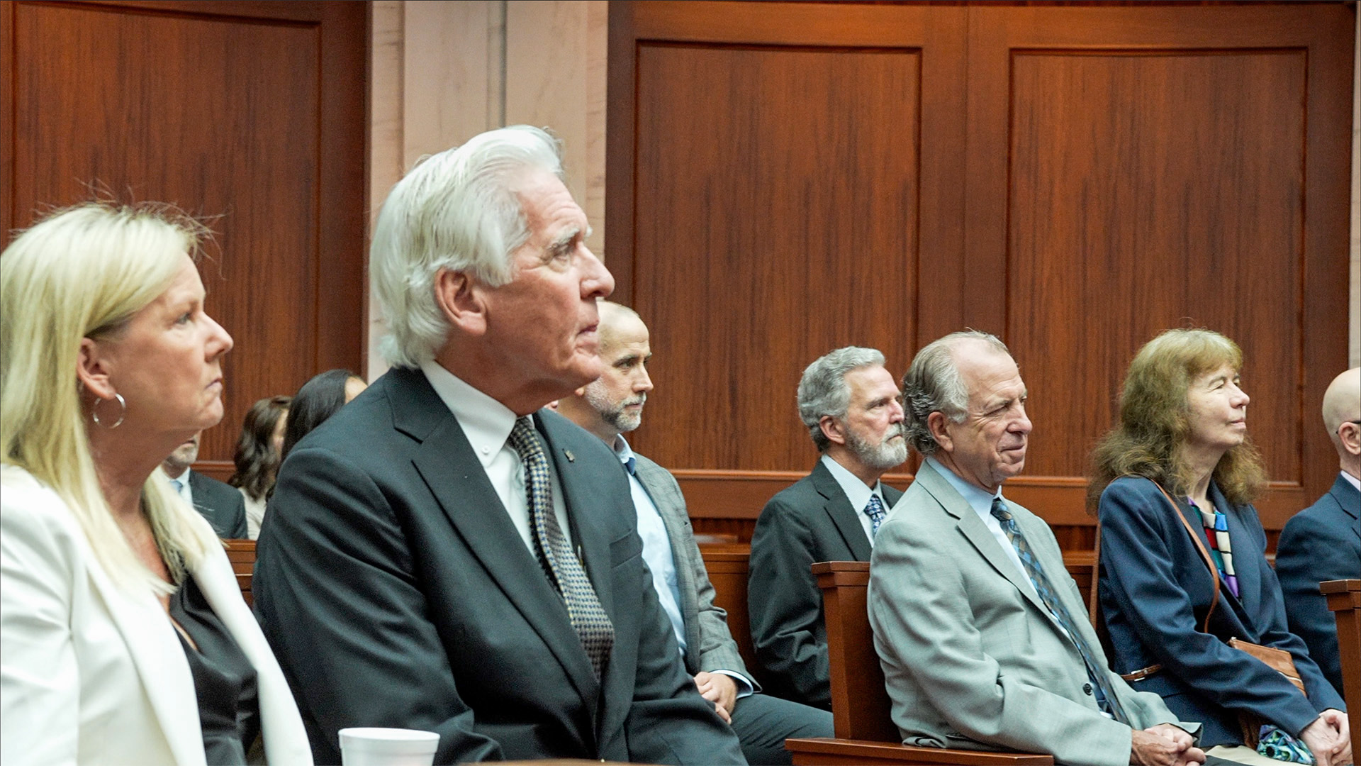 Attorneys and judges seated together as an audience at an ABOTA legal event
