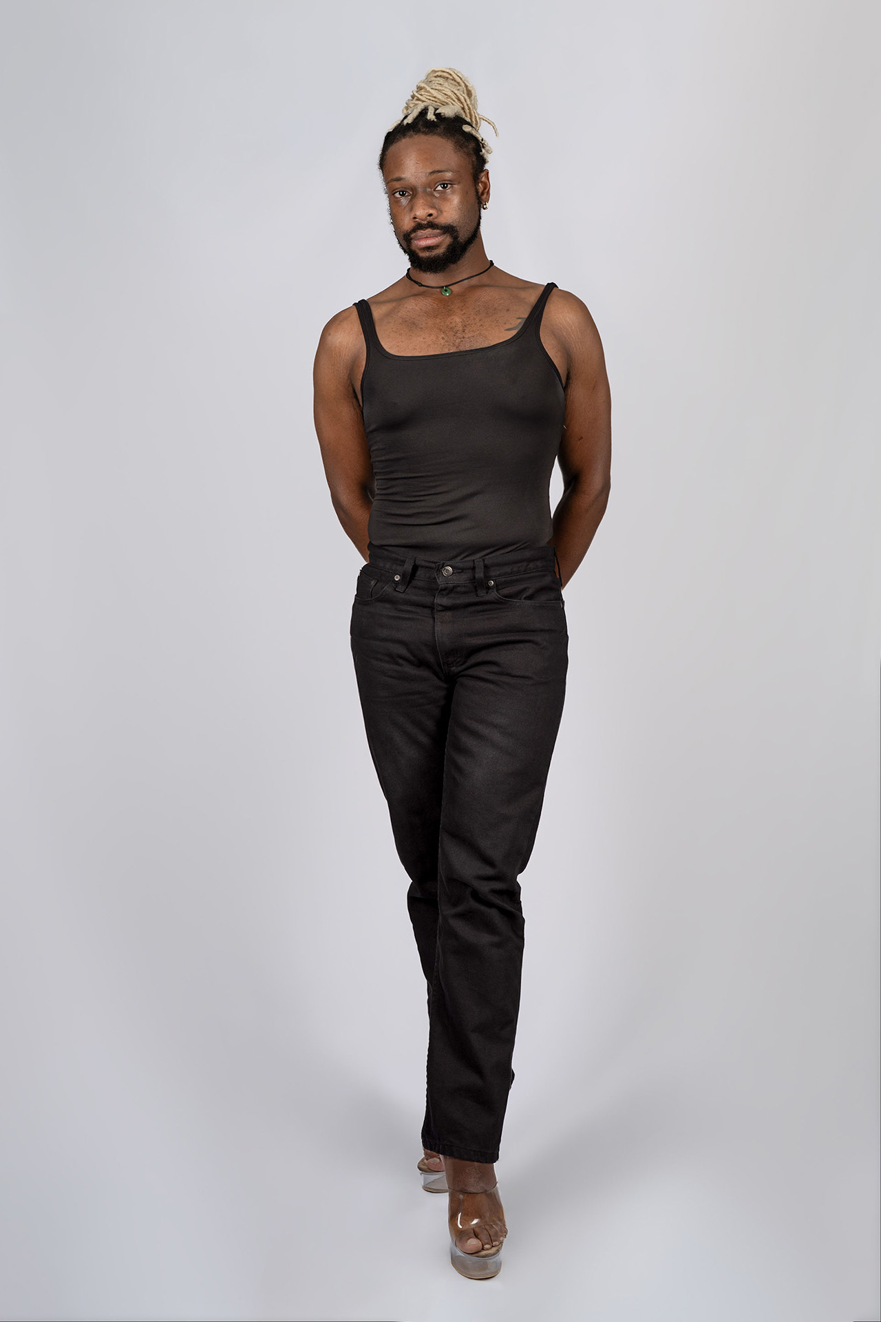 Full-body male model portfolio digital front-facing, second angle, black tank top and pants