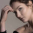 Beauty portrait of a model with her hand framing her face, soft studio lighting, Aurora & Denver photography