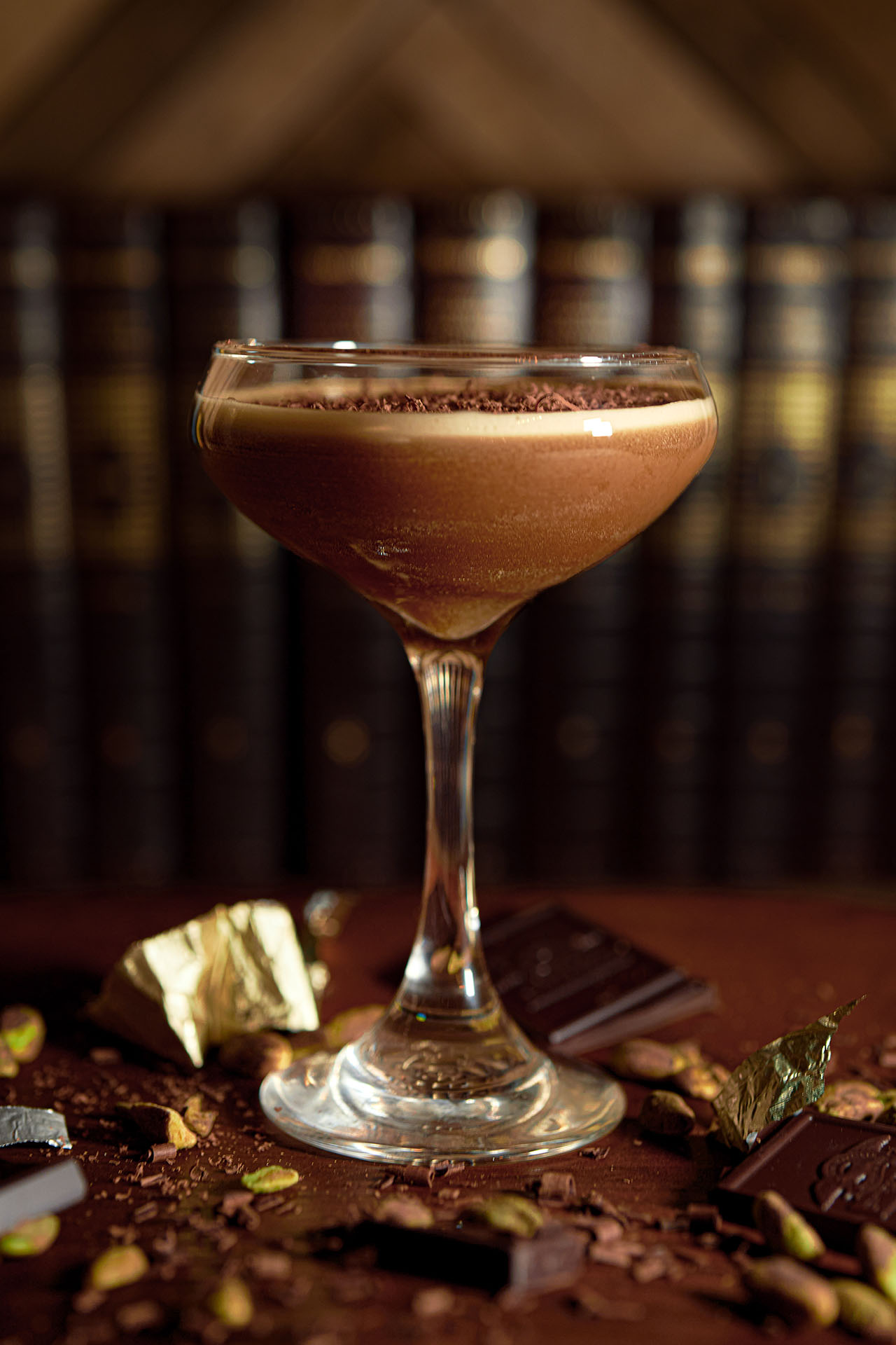 Pistachio espresso and chocolate martini garnished with chocolate shavings and pistachios, at Pretty Neat Bar